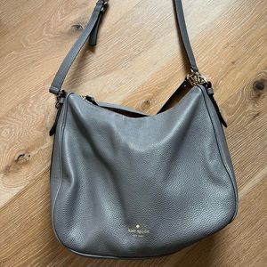 Kate Spade gray cross body with gold accent
